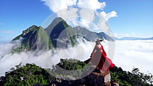 Asian girl on top of Viewpoint of Nong Khiaw Stunning scenery of limestone cliff valley covered with fog