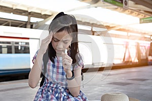Asian girl with vertigo,dizziness,migraine,sick depressed girl s photo