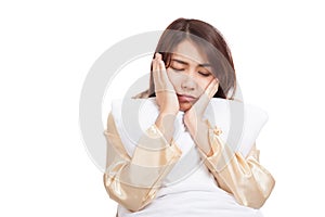 Asian girl wake up sleepy and drowsy with pillow