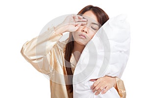 Asian girl wake up sleepy and drowsy with pillow