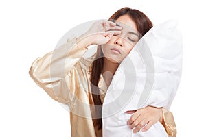 Asian girl wake up sleepy and drowsy with pillow photo