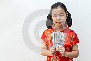 Asian girl wear cheongsam and take Banknote in chinese new year