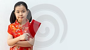 Asian girl wear cheongsam and take Red envelopes in chinese new year