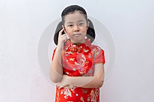 Asian girl wear cheongsam thinking