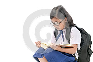 Asian girl wear eyeglasses reading book isolated