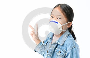 Asian girl wear N95 mask to protect PM 2.5 dust and show victory finger sign