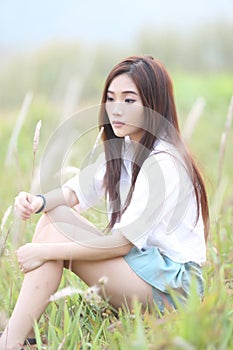 Asian girl at wheat field