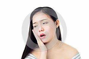 Asian girl in white casual dress Show off the toothache, Maybe because of not maintaining good oral health.