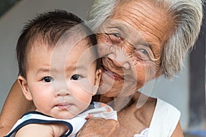 Asian Grandmother with baby