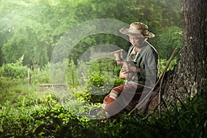 Asian grandmother fisherman with the net