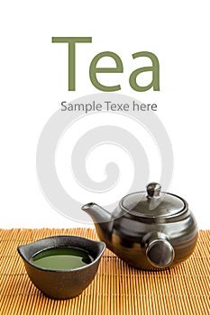 Asian Green tea set on bamboo mat