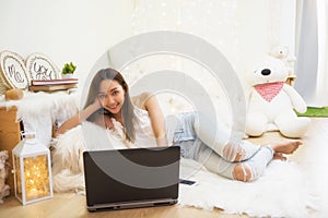 Asian gril relax in living room photo