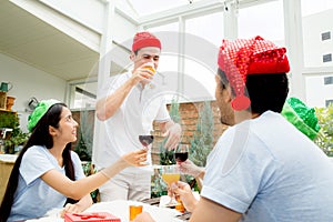 Asian group people drinking at party outdoor.