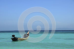 Asian handiwork boat on sea and blue sky