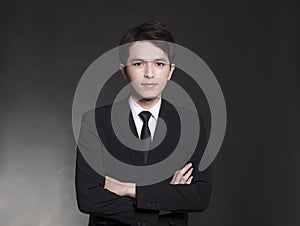 Asian handsome Business man in black suit