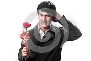 Asian handsome man hold the red rose with love