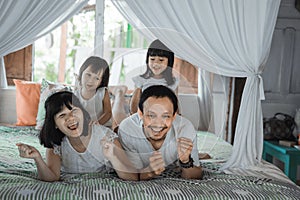 Asian happy family and child daughter laughing together