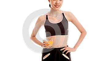Asian healthy girl drinking orange juice