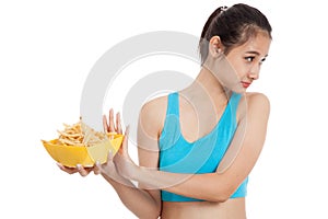 Asian healthy girl hate french fries, junk food