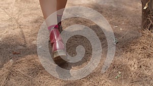 Asian hiker woman trekking in forest. Girls walking forest path wearing mountain boots journey, travel nature and adventure trip,