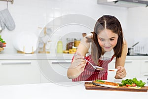 Asian housewives intend to cook in the kitchen photo