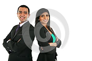 Asian Indian businessman and businesswoman in group standing with folded hands