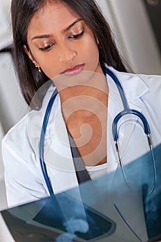 Asian Indian Female Woman Hospital Doctor Looking at X Ray