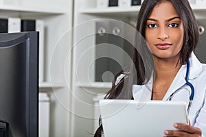 Asian Indian Female Woman Hospital Doctor With Tablet Computer