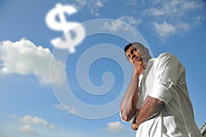 Asian Indian Man thinking about Money