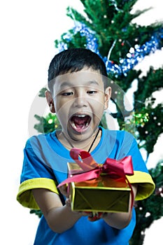 Asian kid exciting to get a Christmas gift