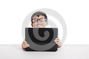 Asian kid with laptop