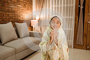 Asian kid muslim praying