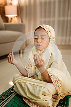 Asian kid muslim praying