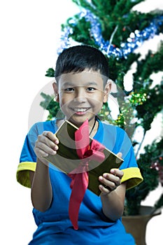 Asian kid smile receive Christmas gift