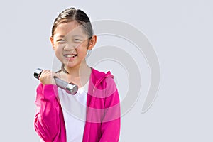 Asian Kid Wearing Sweater Holding Dumbbell, Isolated on White