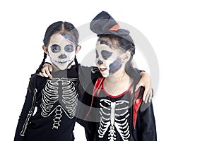 Asian Kids with face-paint and Halloween costumes