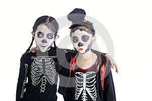 Asian Kids with face-paint and Halloween costumes