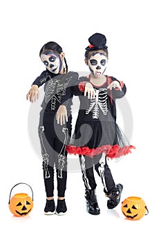 Asian Kids with face-paint and Halloween costumes