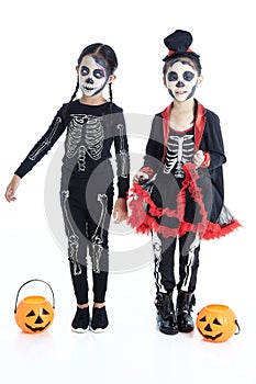 Asian Kids with face-paint and Halloween costumes