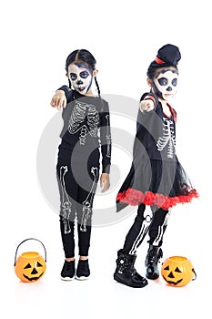 Asian Kids with face-paint and Halloween costumes