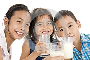 Asian kids with milk