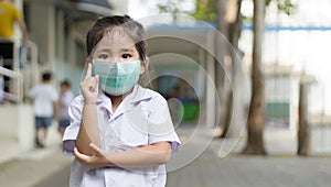 Asian kids student comand action with face mask photo