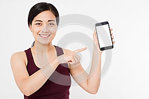 Asian,korean woman hold blank screen cellphone, pointing isolated on white background, hand holding black phone, copy space