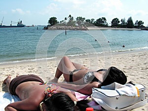 Asian ladies bikini suntanning