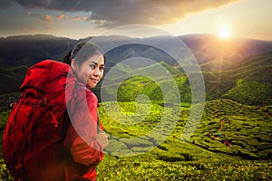 Asian lady backpack and travel the green tea plant in Cameron hi