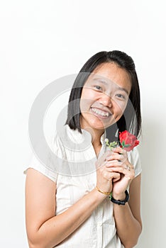Asian lady hold red rose