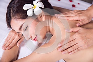Asian lady relax with masage and spa in resort