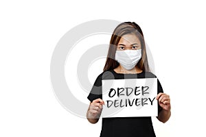 Asian lady standing with order delivery text front view in white plain background. Young long hair lady looking straight wearing f