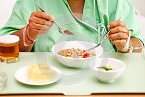 Asian lady woman patient eating breakfast healthy food in hospital.