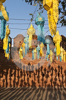 Asian Lanterns and shadow on wall.